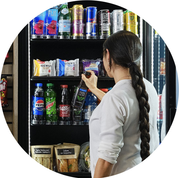 hospitals3 Woman choosing a drink from a vending machine