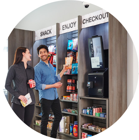 Two people selecting snacks at a smart store